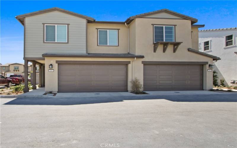 Single Family Attached Home.  Unit on the left.