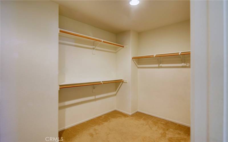 one-half of 7'x14' walk-in closet is shone