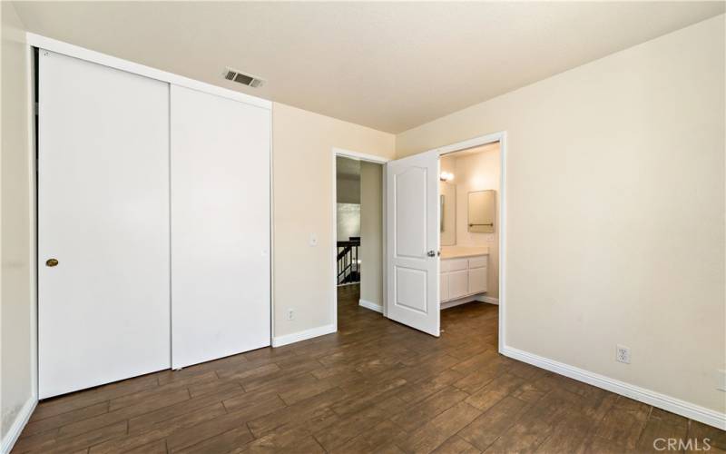 Bedroom #2 w doorway at right leading to 'jack n jill' bathroom