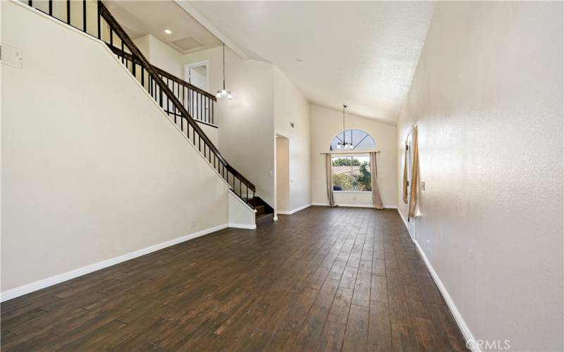 Living room from reverse angle w dining area at rear