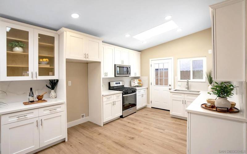 Welcome to your BRAND NEW Kitchen with Soft Close Drawers, Quartz Counter Tops and FULL Backsplash!