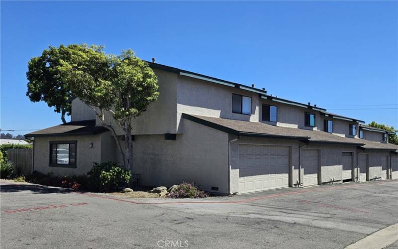 Back of Property (2nd from left, with 1-car garage)