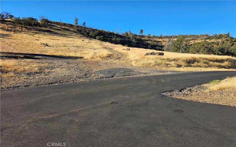 Paved road at the base of the property.