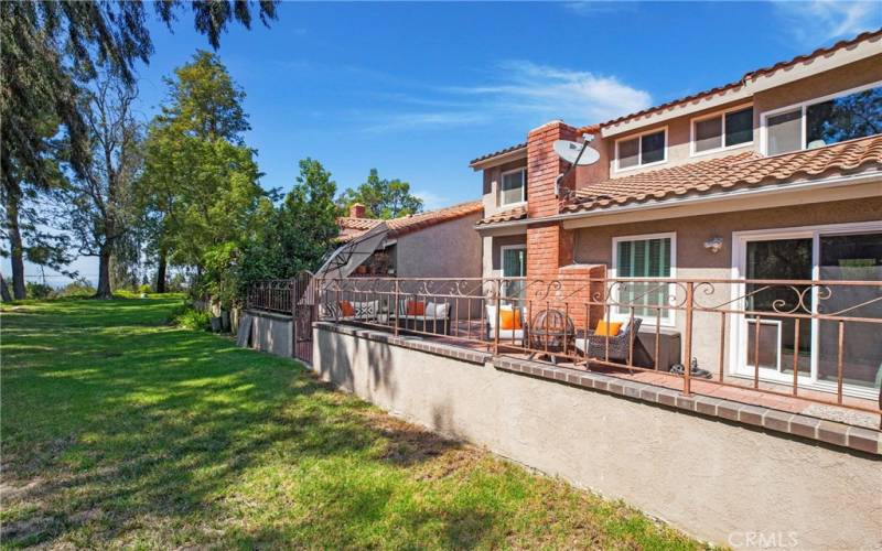 Your patio steps out onto the greenbelt giving you an extended yard you don't have to mow!