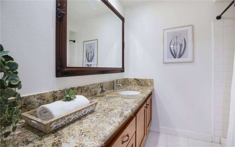 Downstairs bathroom has a HUGE vanity