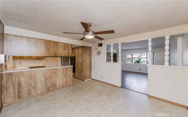 dining area view adjacent to kitchen and living room