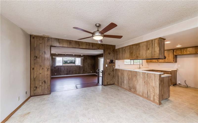 dining area view adjacent to den and kitchen