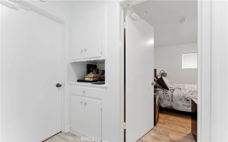 Linen storage between bedrooms.