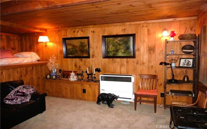 The Lower Level Of The Cabin Features A Good Sized Faily Room