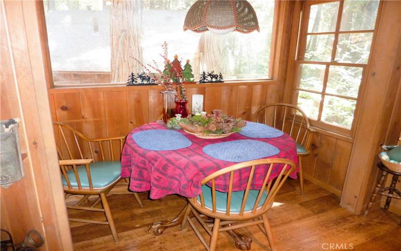 Just Off The Kitchen Is A Sunny Pop Out Dining Nook