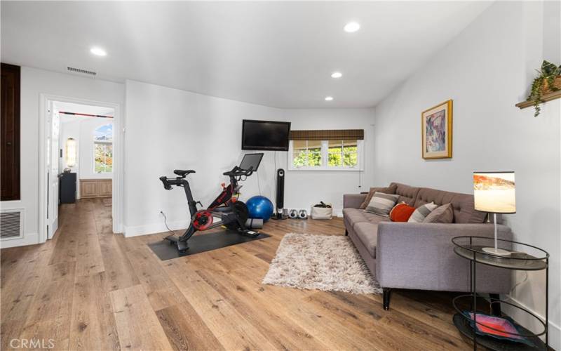 Loft area set up for workouts or relaxing in.