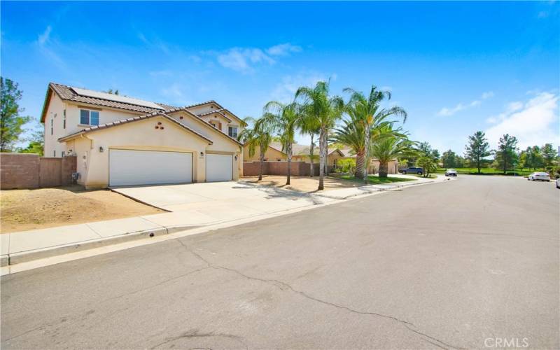 Front Street View with possible RV parking on Both sides of the property. Notice close walk to Park