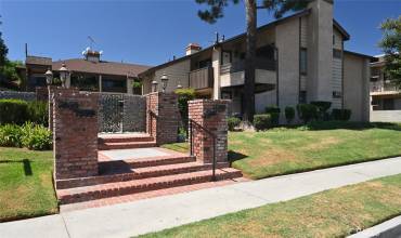 Gated entry opens to court yard