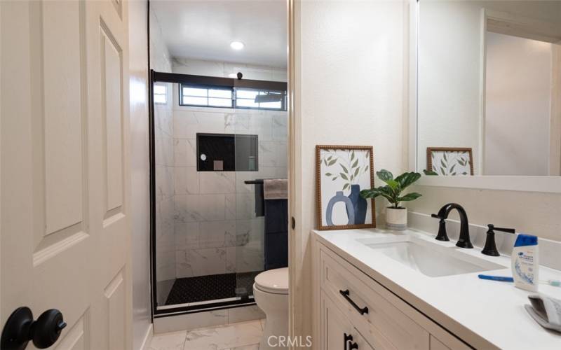 Private shower with custom tile surround