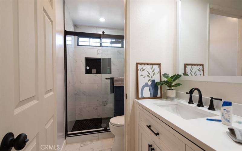 Private shower with custom tile surround