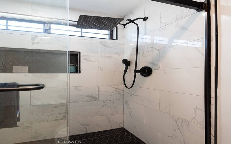 Frameless style shower doors, nook & handheld shower