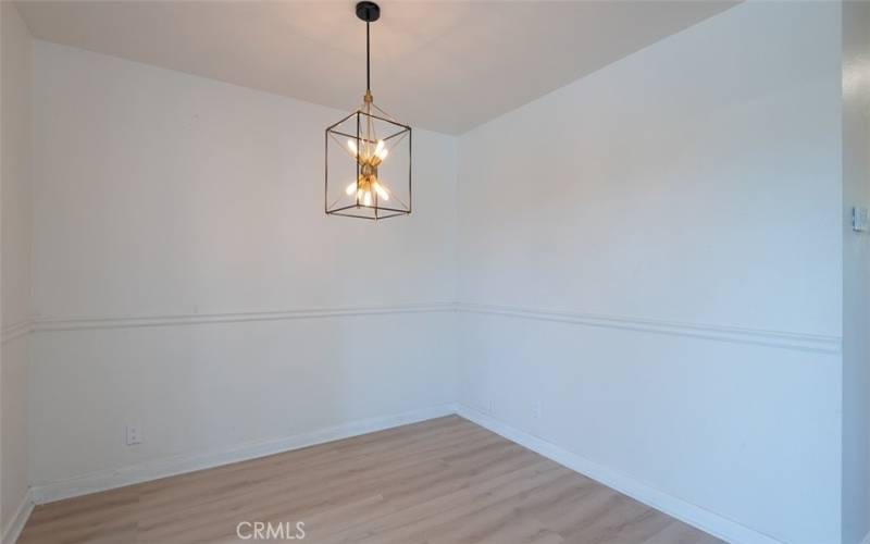 Dining area has new modern lighting