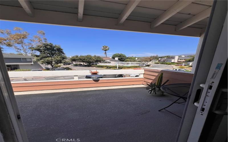 Balcony view looking towards pool area.