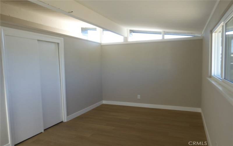 Bedroom 2.  Up above to the left is a small loft area.