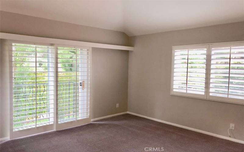 Master bedroom - Sliding shutters on sliding doors for privacy