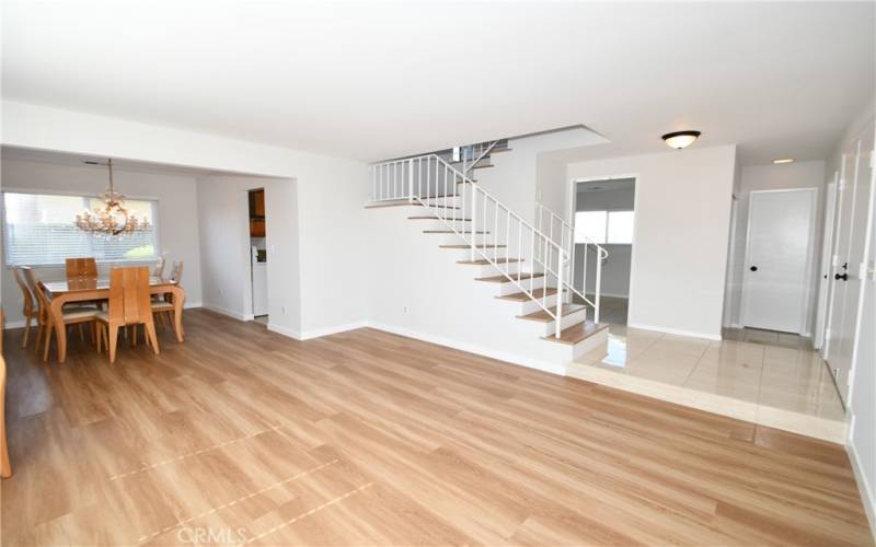 Foyer and stairs.  Door on right is to hallway and garage.