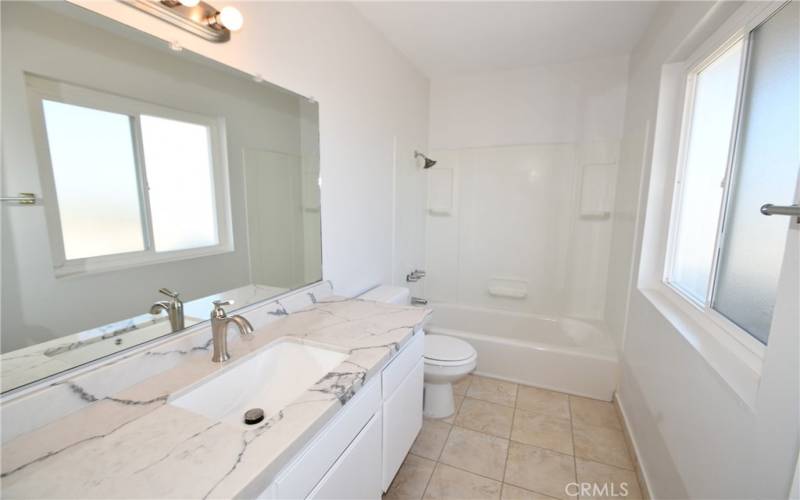 Remodeled full bath upstairs.  Vanity is original but counter top is newer.