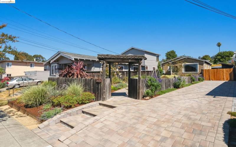 Driveway to gated back yard