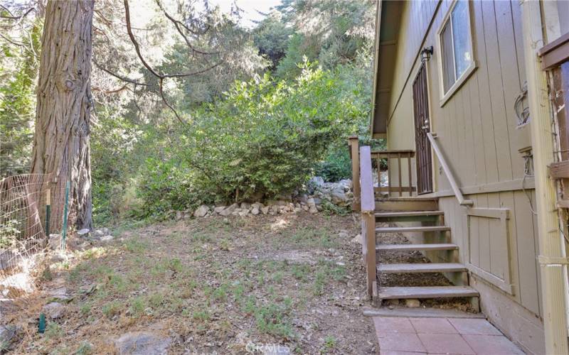 Side yard with access to kitchen