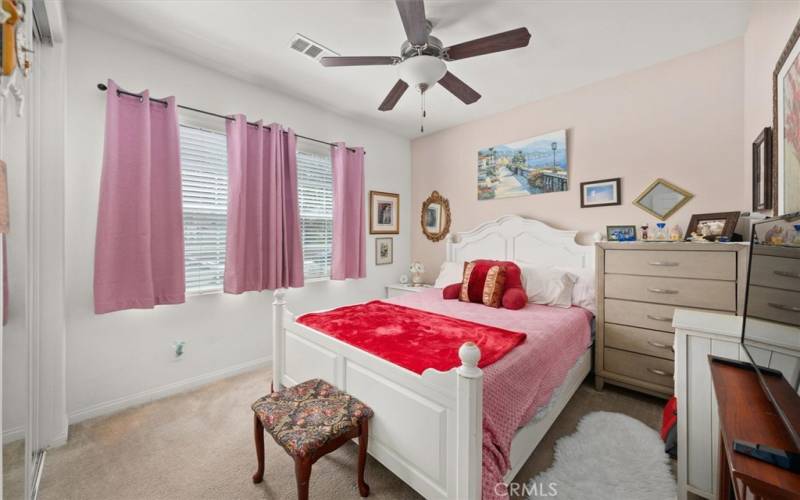 Front Bedroom, ceiling Fan, mirrored wardrobe.