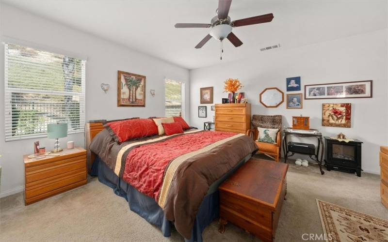 Master with ceiling fan

& located separate from other bedrooms.