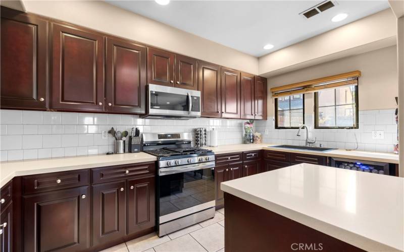 Quartz countertops and mahogany cabinets