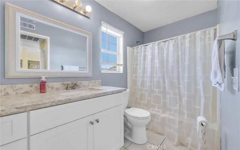 Bathroom with tub/shower.