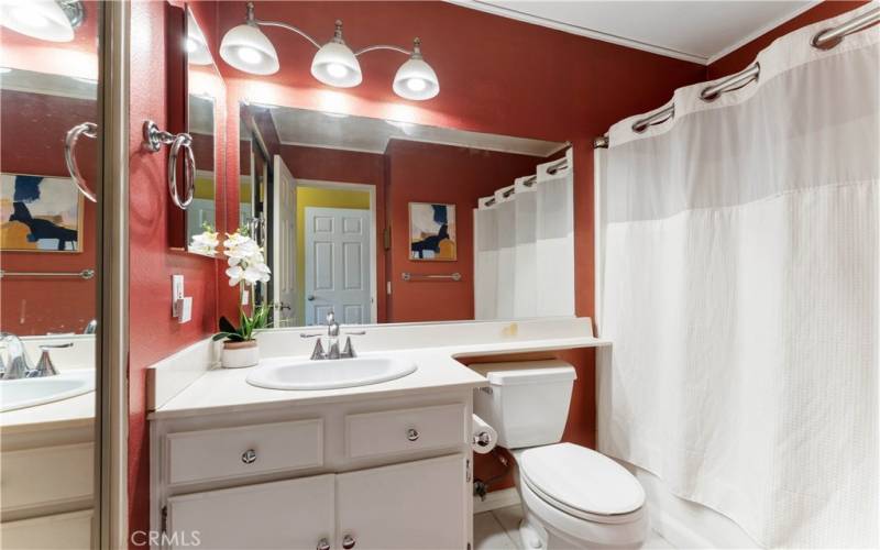 Second bedroom's private bath with closet.