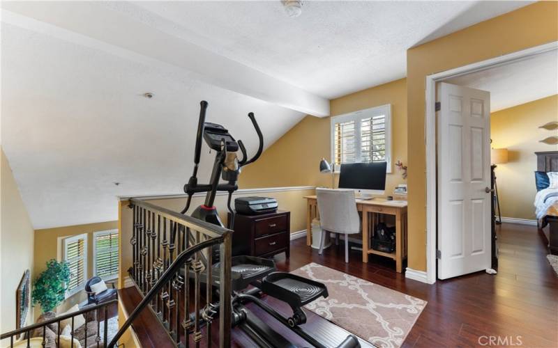 Roomy loft right off from the primary bedroom with double doors.