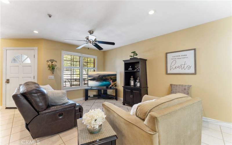 Family room with window view of the spacious patio.