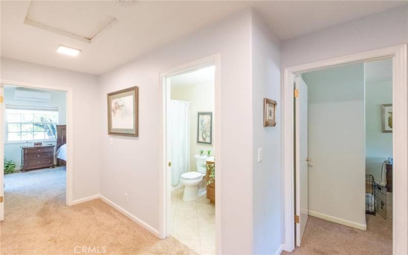 Wide hallway bath.