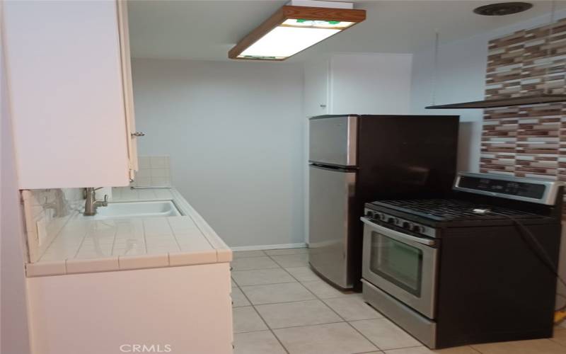 Kitchen and Appliances. Fridge and Stove Included