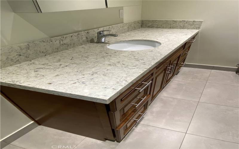 Travertine Countertops In all Bathrooms