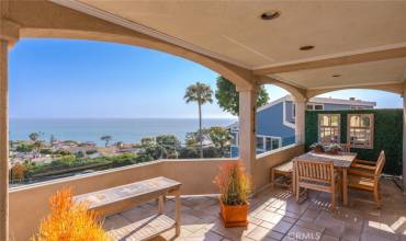 Outdoor deck with ocean views from Kitchen/living space