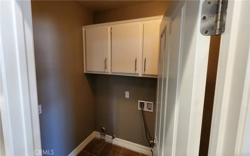 Laundry room located off kitchen