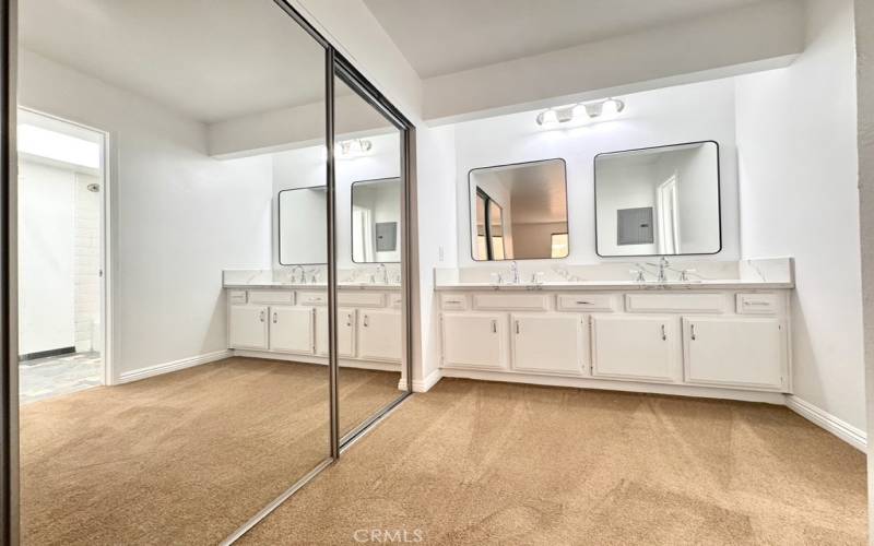 Primary vanity with walk-in to the left