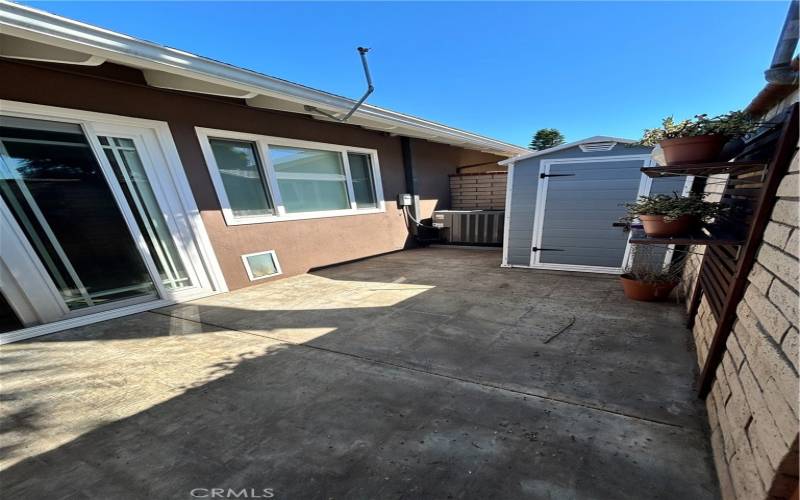 enclosed patio with shed