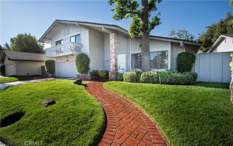 Luscious landscaping up to this home