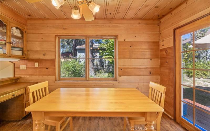 dining area leads to side yard