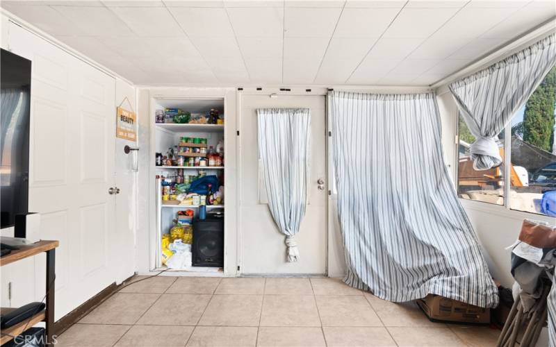 Back door entrance through covered patio