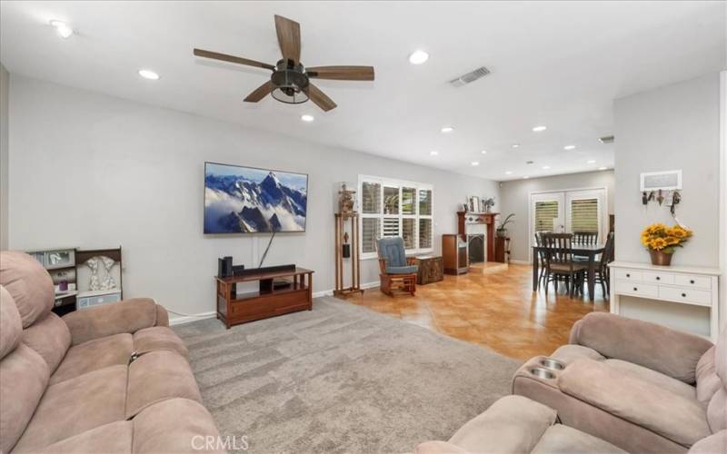 Living room has access to dining room & fireplace