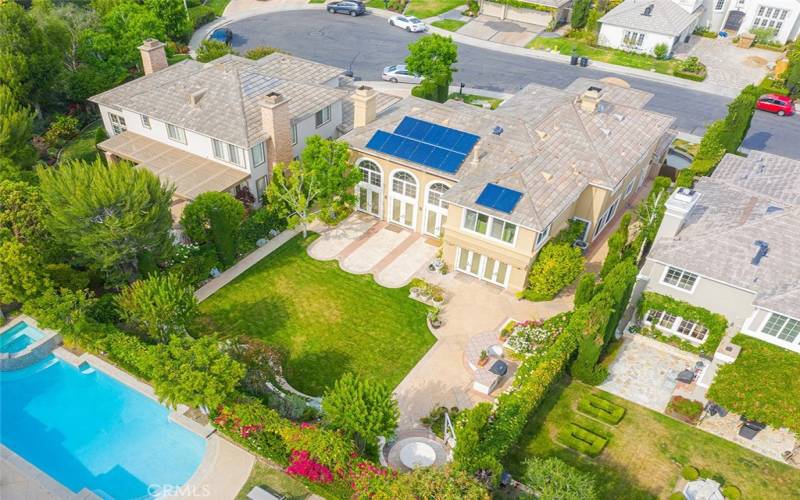 Aerial view of backyard and house