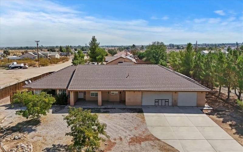 Three car garage and lots of room in both side yards.