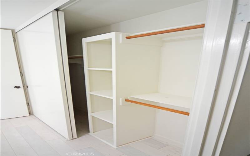 A photo of one of the upstairs closet spaces.