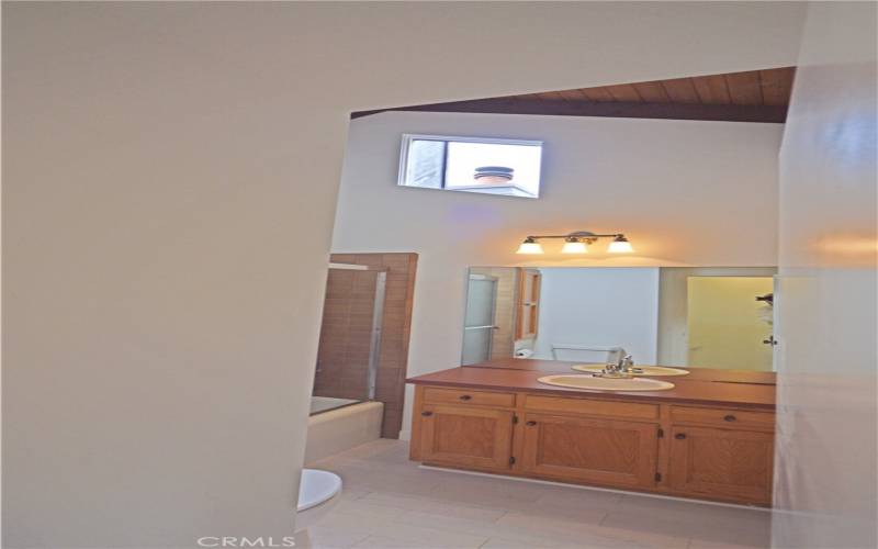 The second upstairs bathroom also has a tub with a shower.  Note the high ceilings.